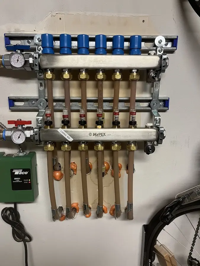 Plumber performing Water Heater Repair at a residential property in Pleasantville